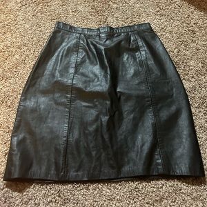 vintage “outerwear” by phoenix, leather mid-thigh length skirt